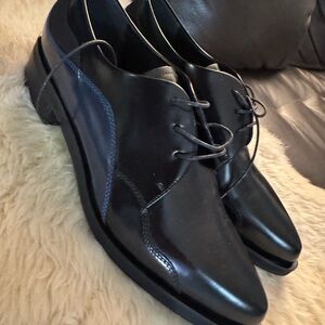 Sportmax Black Patent Leather Oxford shoes for women.